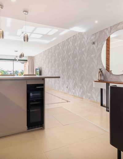 After: open kitchen with feature wall