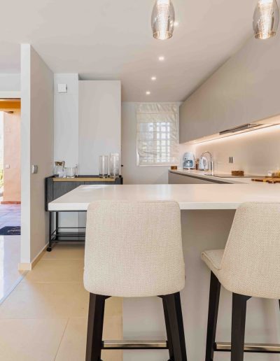 After: renovated kitchen with island seating