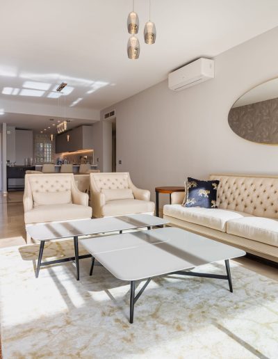 After: bright lounge with modern seating