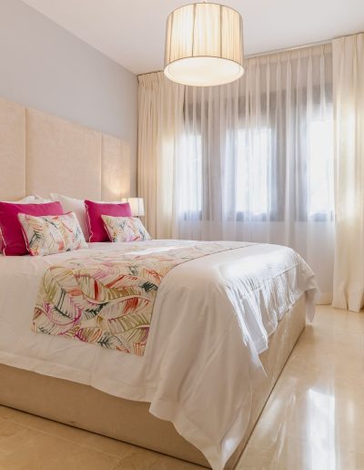 After: bright bedroom with floral accents