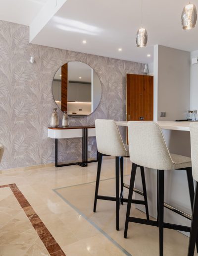 After: breakfast bar with feature wall