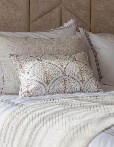 After: neutral bed cushions close-up