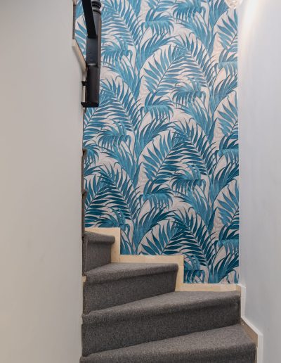 After: stairway with patterned wallpaper