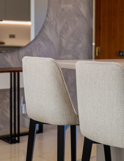 After: dining chairs with feature wall