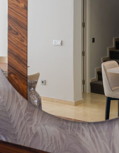 After: hallway mirror and stair landing