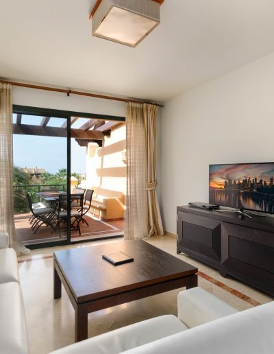 Before: lounge with balcony doors