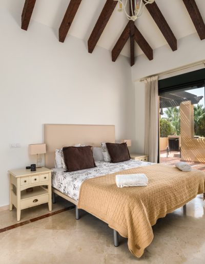 Before: bedroom with balcony access